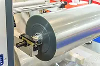 Roll of laminated film being rewound after production